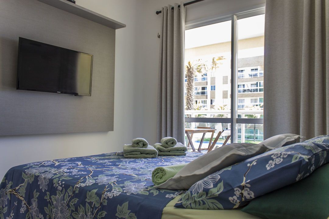 Apartamento clássico, vista parcial para o mar | Cortinas blackout, ferros/tábuas de passar roupa, Wi-Fi de cortesia