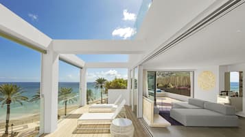 Suite, 1 King Bed, Non Smoking, Sea View (Terrace) | 1 bedroom, hypo-allergenic bedding, pillow-top beds, minibar