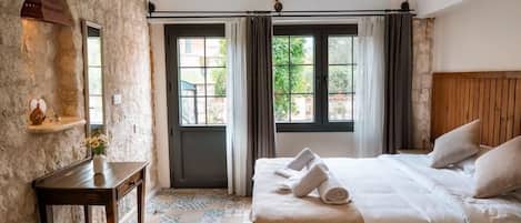 Standard Room | エジプト綿のシーツ、高級寝具、羽毛の掛け布団、客室ごとに異なる装飾