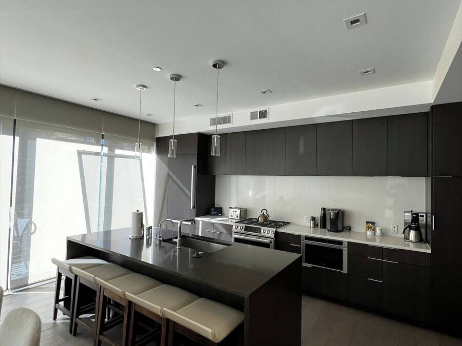 Suite, 4 Bedrooms (Lift) | Shared kitchen | Mini-fridge, microwave