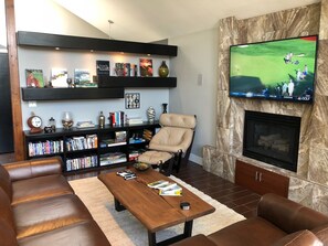 Smart TV, fireplace, DVD player, books