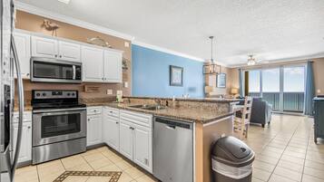 Coffee/tea maker, fridge, microwave, oven