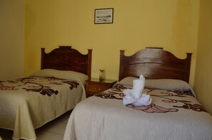 Quadruple Room, 2 Double Beds | Free WiFi, bed sheets - Hotel Camelinas Área Blanca (Patzcuaro)