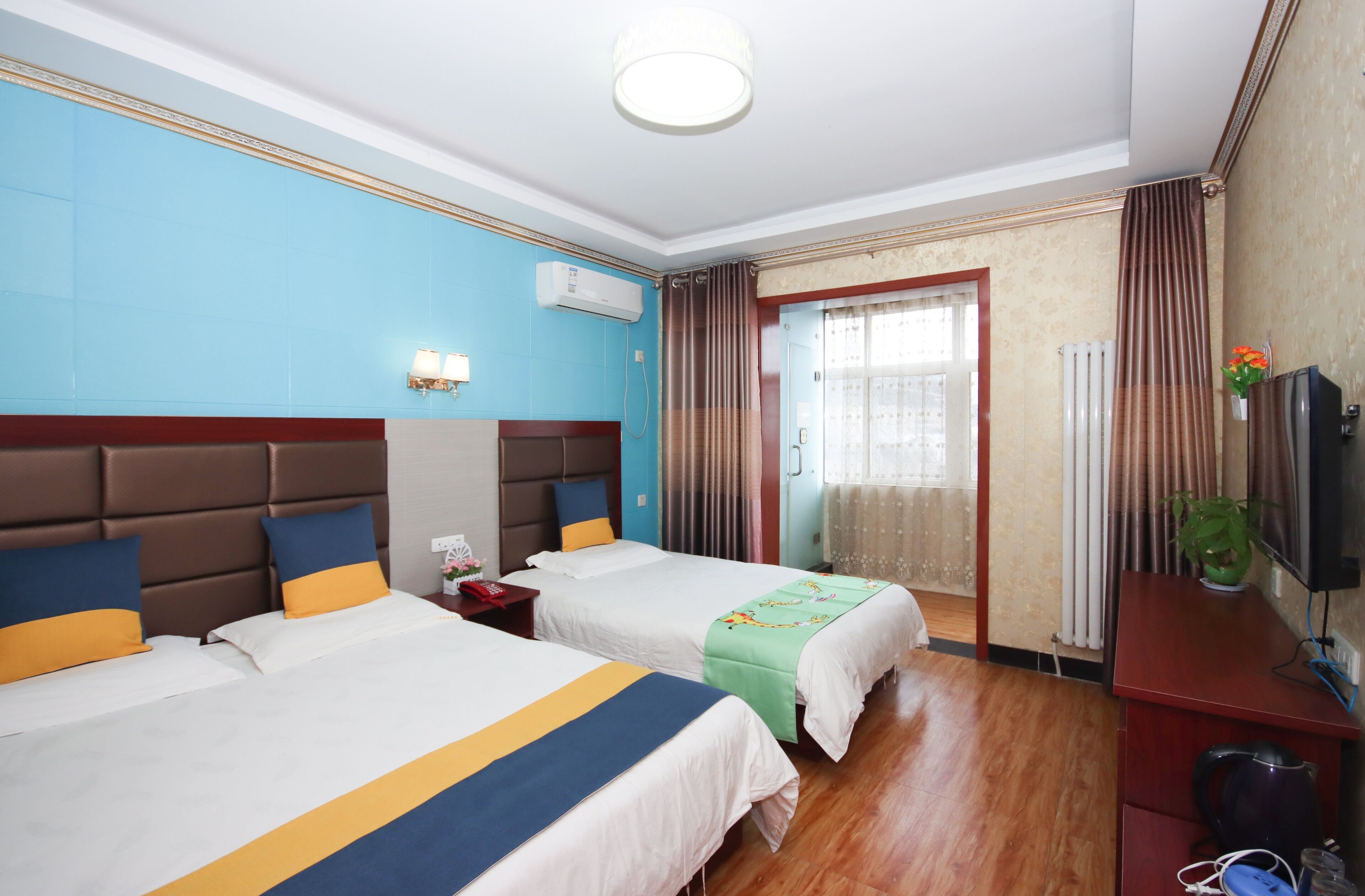 deluxe family room | 1 bedroom, down duvets, individually decorated, desk