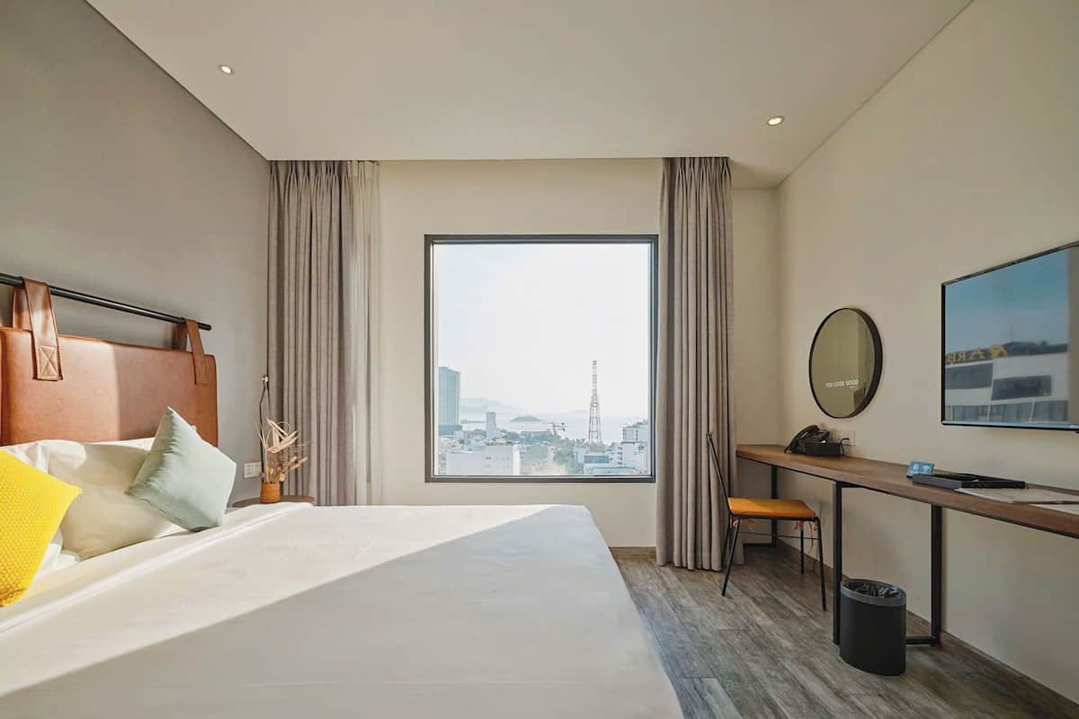 Superior Double Room, Partial Sea View | Minibar, in-room safe, individually decorated, individually furnished