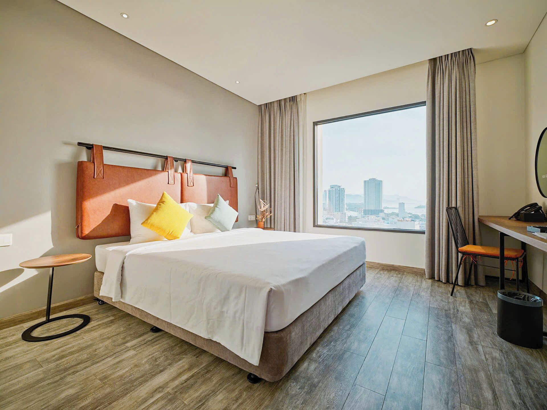 Superior Double Room, Partial Sea View | Minibar, in-room safe, individually decorated, individually furnished