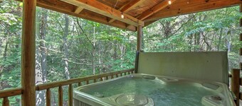Secluded Cabin Getaway with Hot Tub, Kitchen, and Fireplace