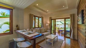 Comfort Villa, 1 King Bed with Sofa bed, Partial Ocean View, Garden Area | Living area