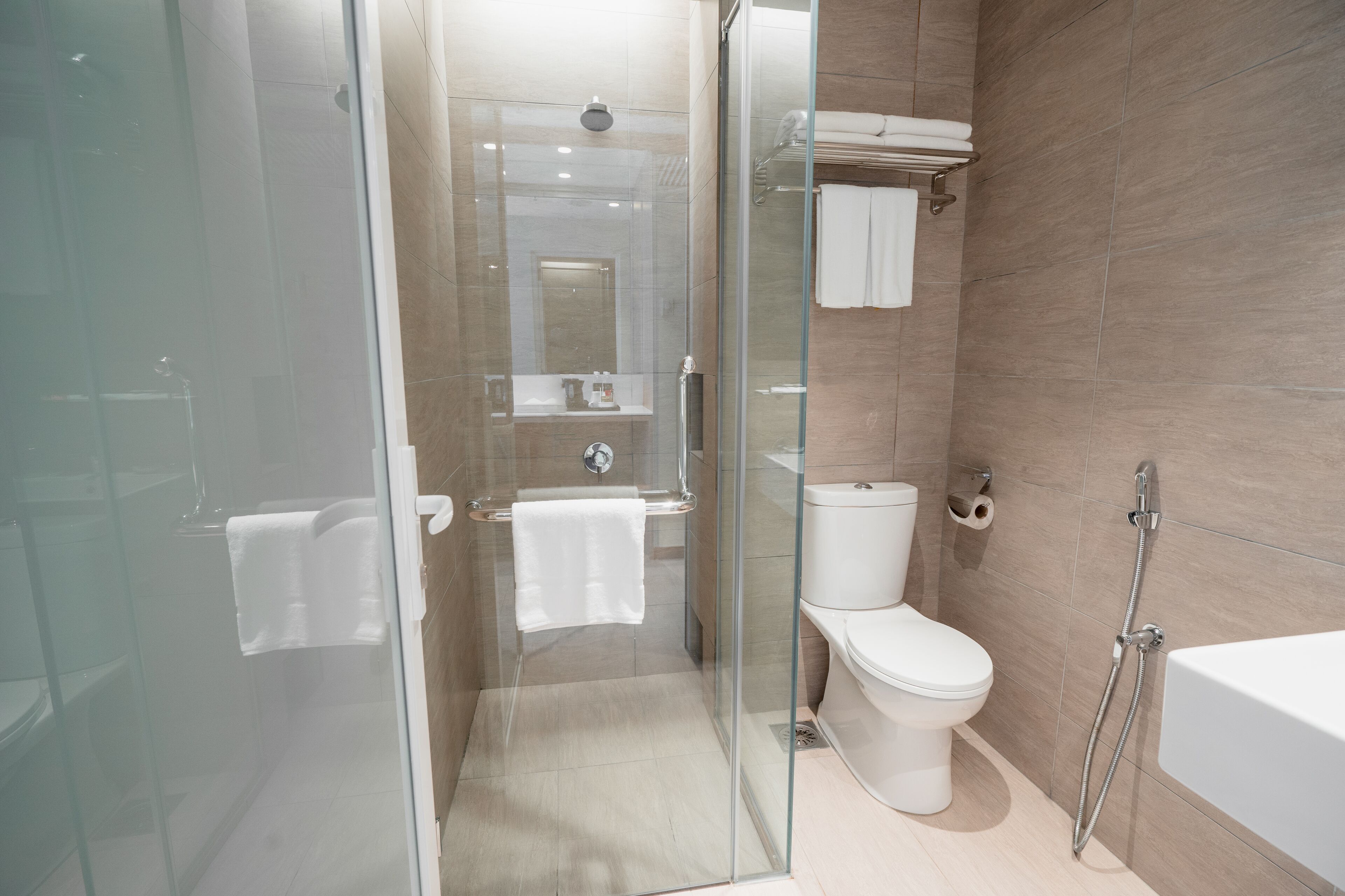 shower, free toiletries, slippers, bidet