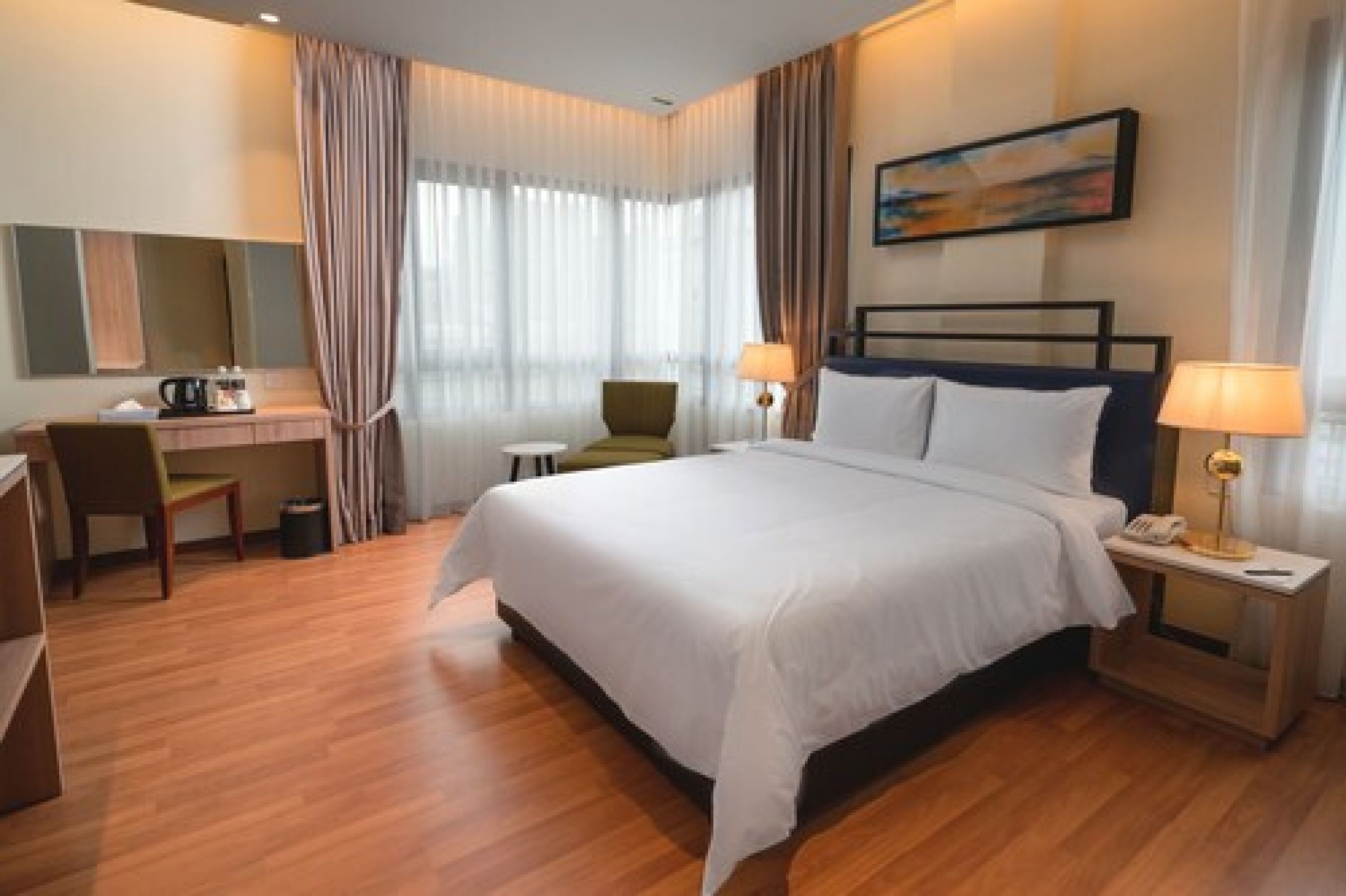 deluxe room, city view | in-room safe, blackout curtains, soundproofing, iron/ironing board