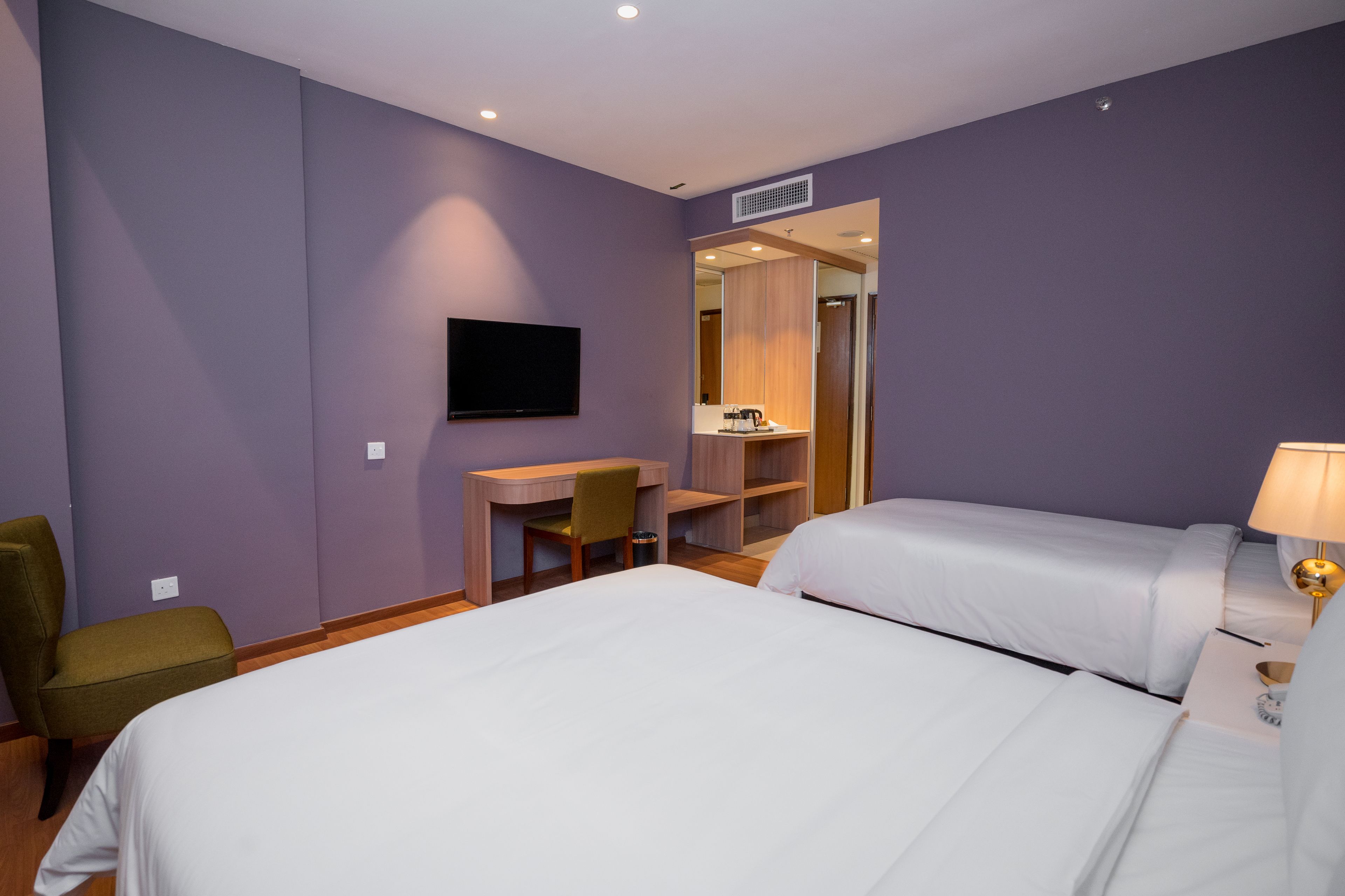 family room, multiple beds | in-room safe, blackout curtains, soundproofing, iron/ironing board