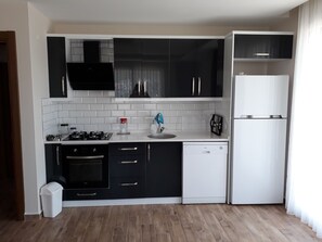 Apartment, 1 Bedroom | Private kitchenette