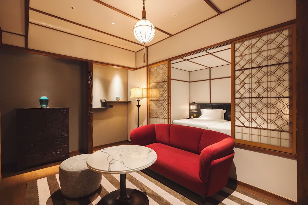 Premier Twin Room | 1 bedroom, down comforters, minibar, iron/ironing board