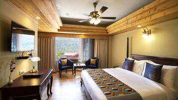 Superior King Valley View | Premium bedding, minibar, in-room safe, individually decorated