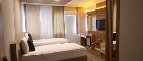 Standaard kamer | Een kluis op de kamer, gratis wifi, beddengoed