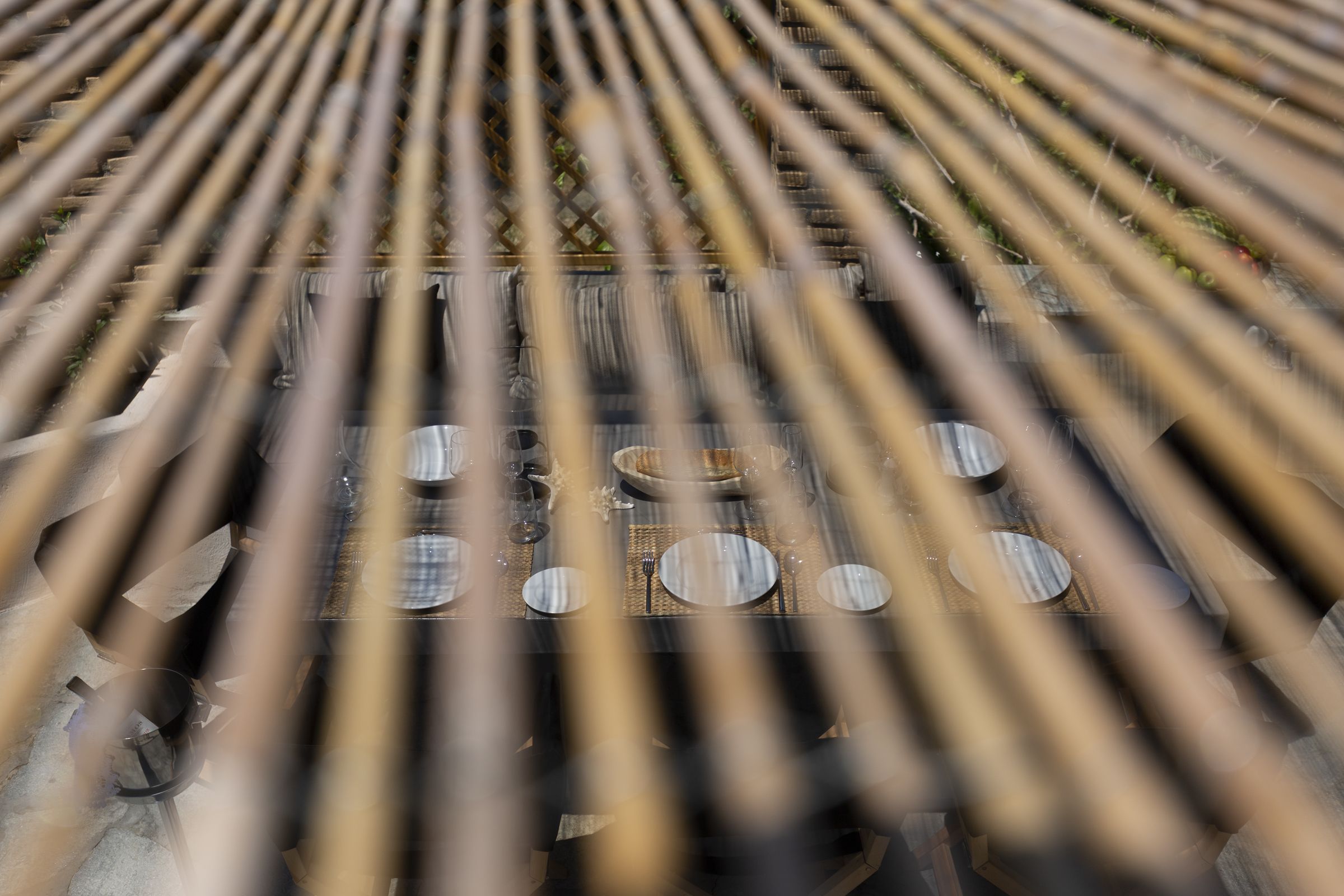 A close-up of a mechanical or industrial structure with pipes and circular components.