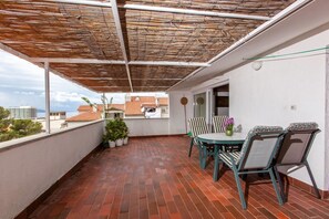 Apartment, Mehrere Betten | Balkon