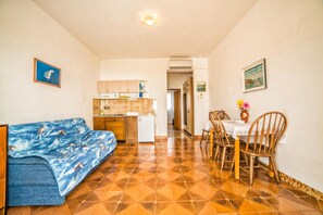 Apartment, 1 Doppelbett und Schlafsofa | Wohnzimmer | Fernseher