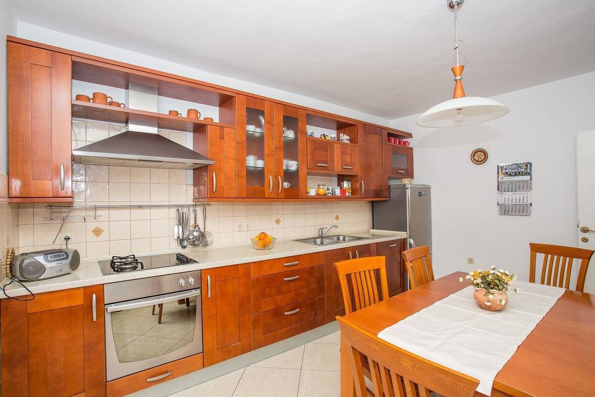 Apartment, 2 Double Beds | Private kitchen | Fridge, oven