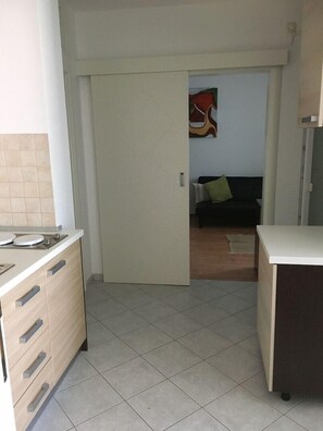 Apartment, Multiple Beds | Private kitchen
