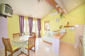 Appartement, plusieurs lits | Salle de séjour