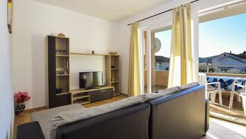 Appartamento, letti multipli | Soggiorno | TV