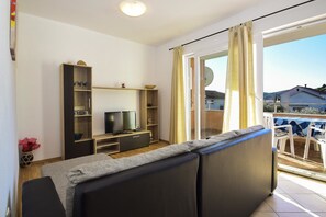 Appartamento, letti multipli | Soggiorno | TV