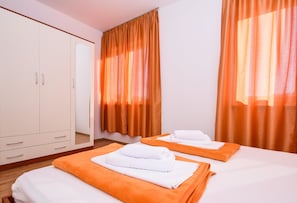 Appartamento, letti multipli | 2 camere, Wi-Fi gratuito, lenzuola