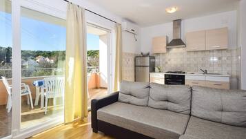 Apartment, Multiple Beds | Living room