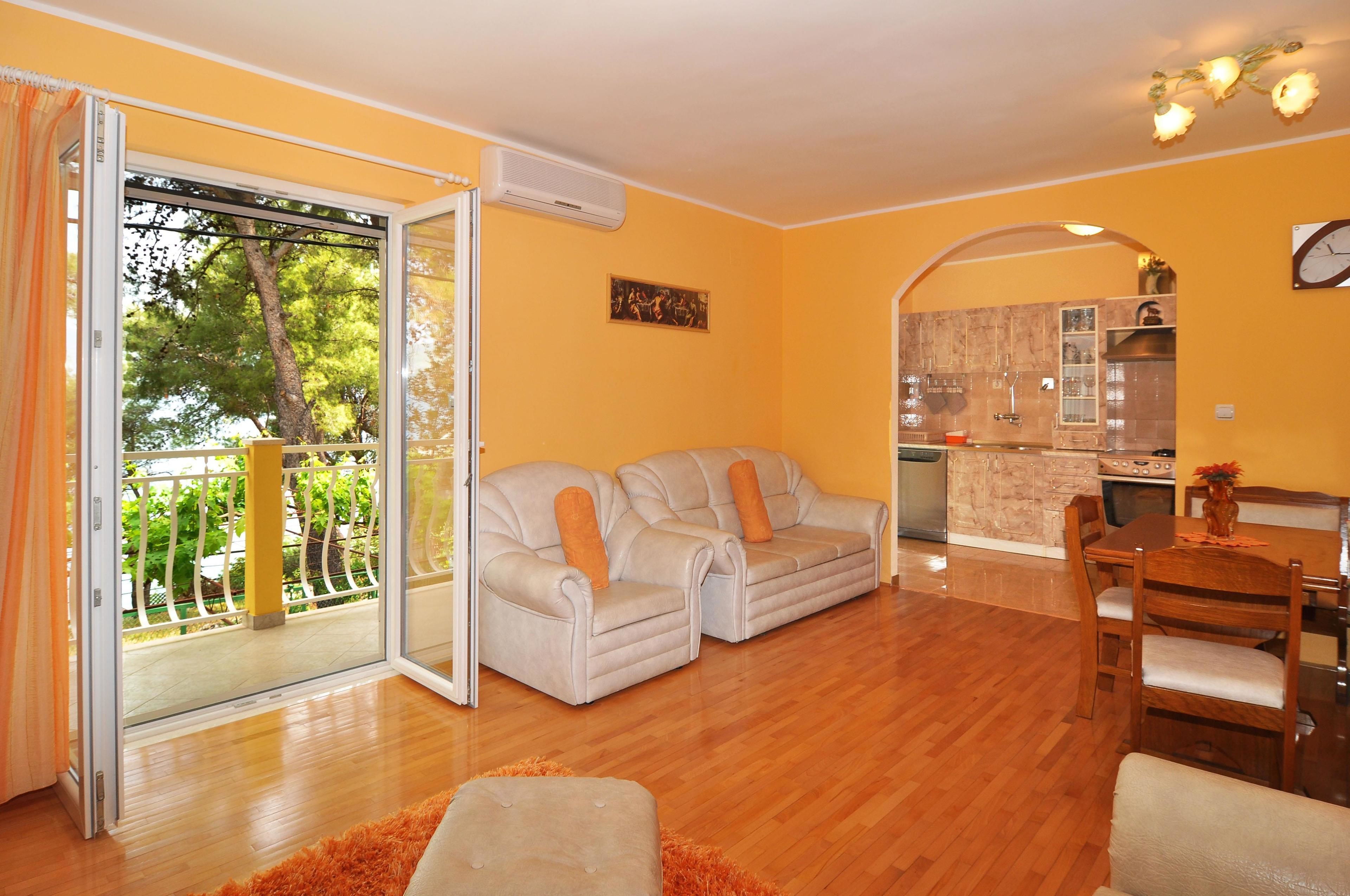 Apartment, Multiple Beds | Living room | TV