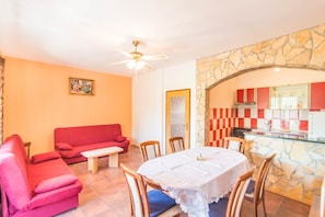 Appartement, plusieurs lits | Cuisine privée