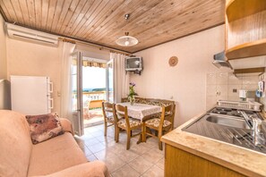 Appartement, plusieurs lits | Cuisine privée