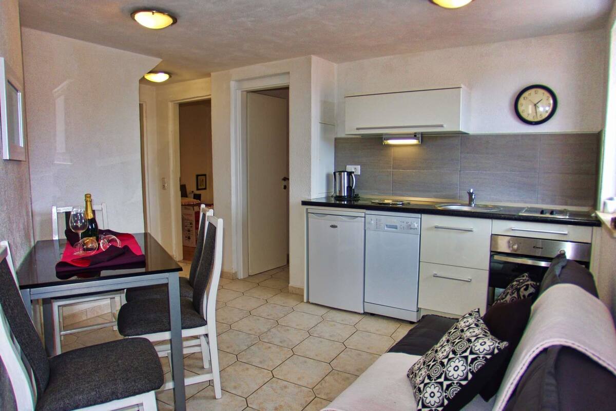 Departamento, 2 camas matrimoniales | Cocina privada | Refrigerador, parrilla de estufa, lavavajillas y tostadora