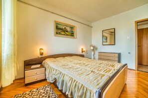 Apartamento, várias camas | 3 quartos, Wi-Fi de cortesia, roupa de cama