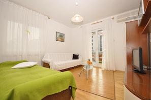 Appartement, plusieurs lits | Salle de séjour