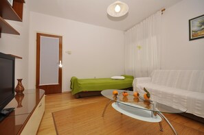 Appartement, plusieurs lits | Salle de séjour