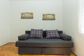 Apartment, Mehrere Betten | Wohnzimmer