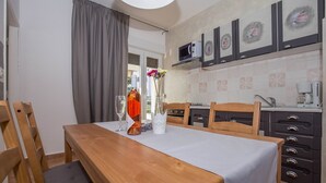 Apartament, diversos llits | Cuina privada