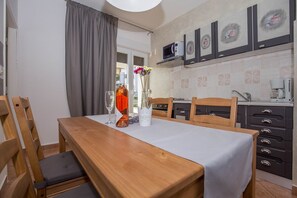 Appartamento, letti multipli | Cucina privata | Piano cottura, pentole/stoviglie/utensili