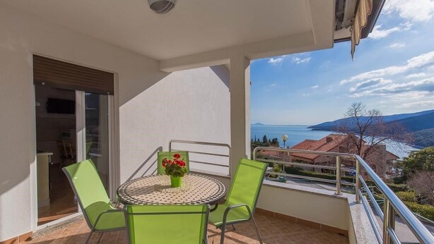 Apartament, diversos llits | Balcó