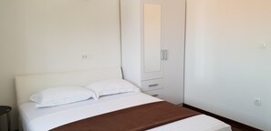 Apartment, 2 Double Beds | Iron/ironing board, free WiFi, bed sheets