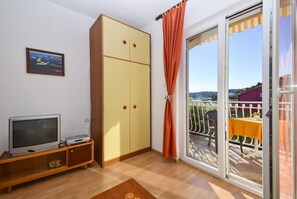 Appartamento, letti multipli | Soggiorno | TV