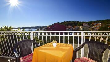 Appartamento, letti multipli | Balcone