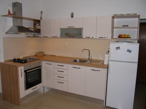 Placa de cocina, utensilios de cocina