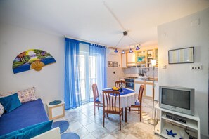 Apartment, 1 Doppelbett und Schlafsofa | Wohnzimmer | Fernseher