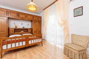 Apartamento, 2 camas de casal | Wi-Fi de cortesia, roupa de cama