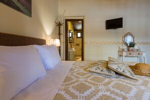 Tabla de planchar con plancha, wifi gratis y ropa de cama 