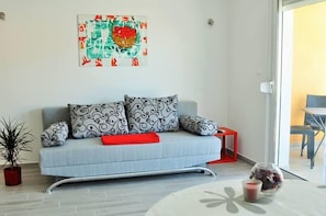 Apartamento, 1 cama de casal e sofá-cama | Sala de estar | TV