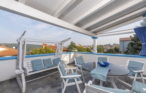 Appartement, plusieurs lits | Terrasse/Patio