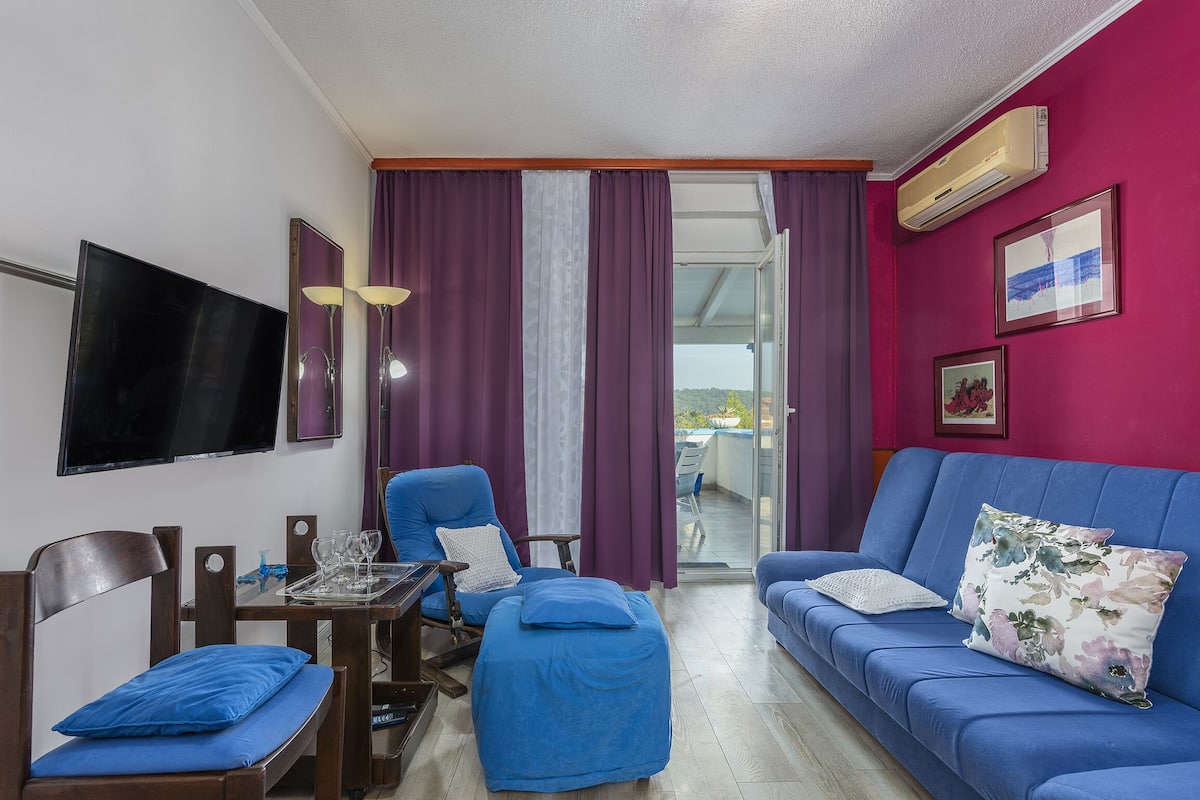 Apartment, Multiple Beds | Living room | TV